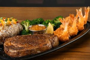 13oz Rockhampton Ribeye* & Choice of Shrimp